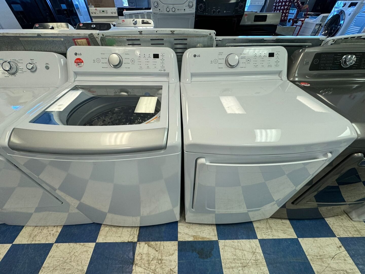 7.3 cu. ft. Ultra Large Capacity Electric Dryer with Sensor Dry Technology And 7.3 Cuft Top Load Washer