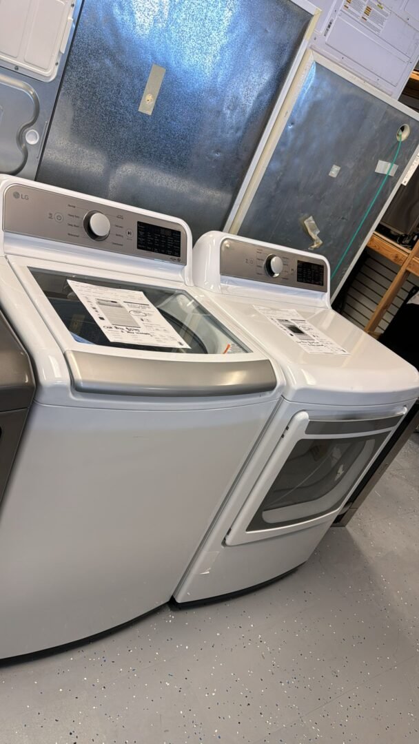 New LG 5.5 Top Load Washer With 7.3 LG Gas Dryer