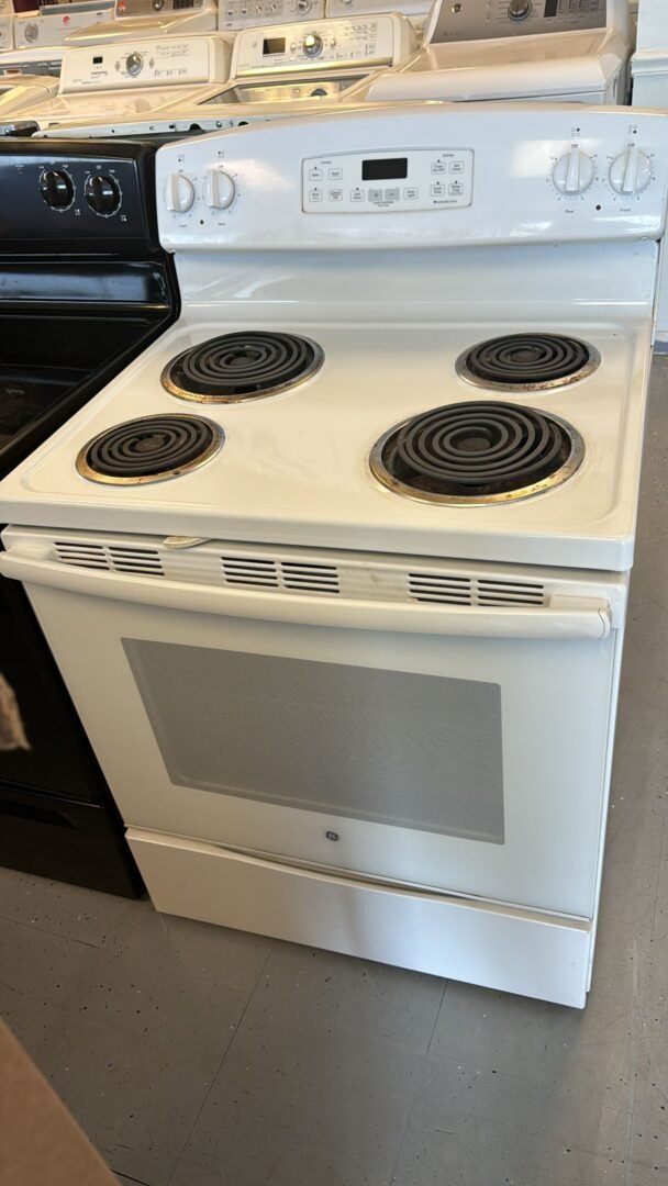 GE Used 4 Coil Top Stove Freestanding